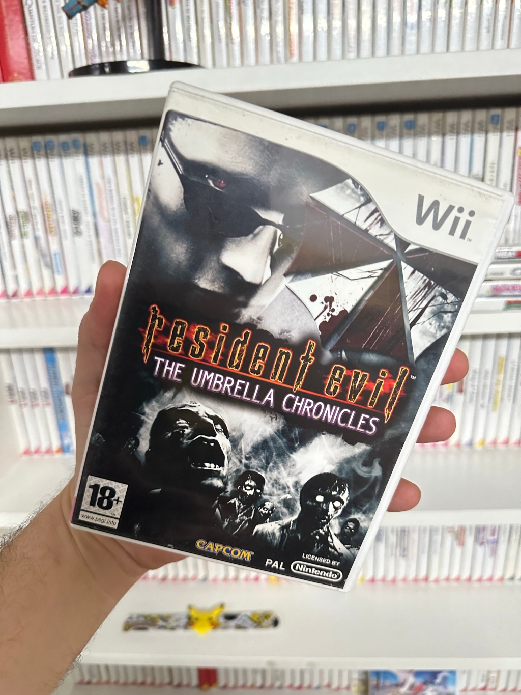 Resident Evil: Umbrella Chronicles – Wii’s Horror Saga (2007) 🧟🎵🕹️